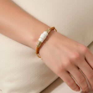 Banana Republic Women's tan Suede white Bead Gold Black Tassel Horsebit bracelet
